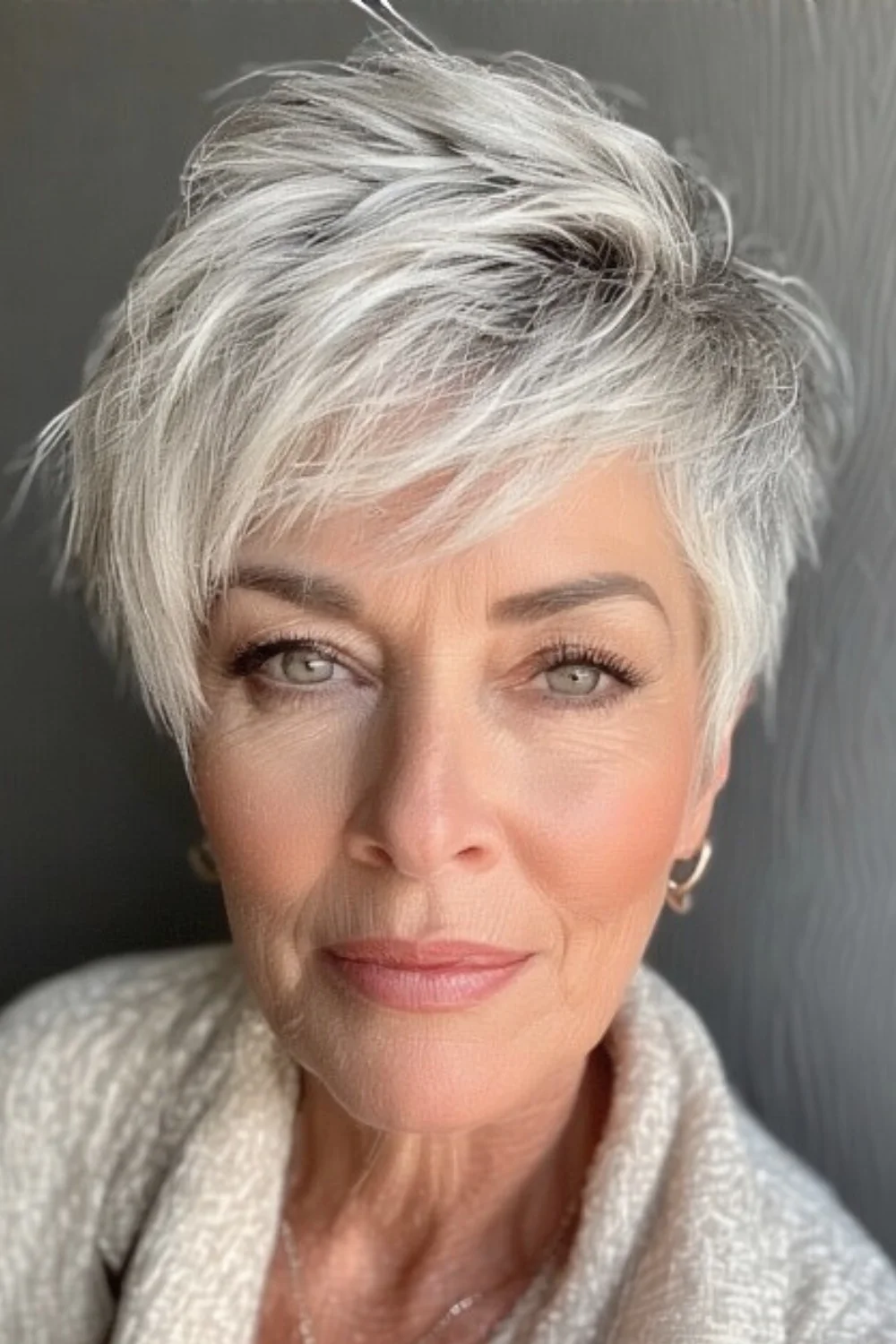 Stylish asymmetrical pixie cut designed for older women
