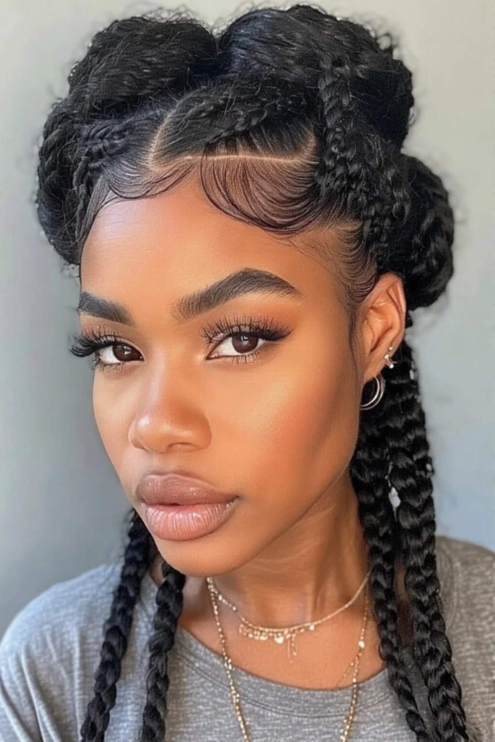Bantu knots hairstyle combined with intricate braids