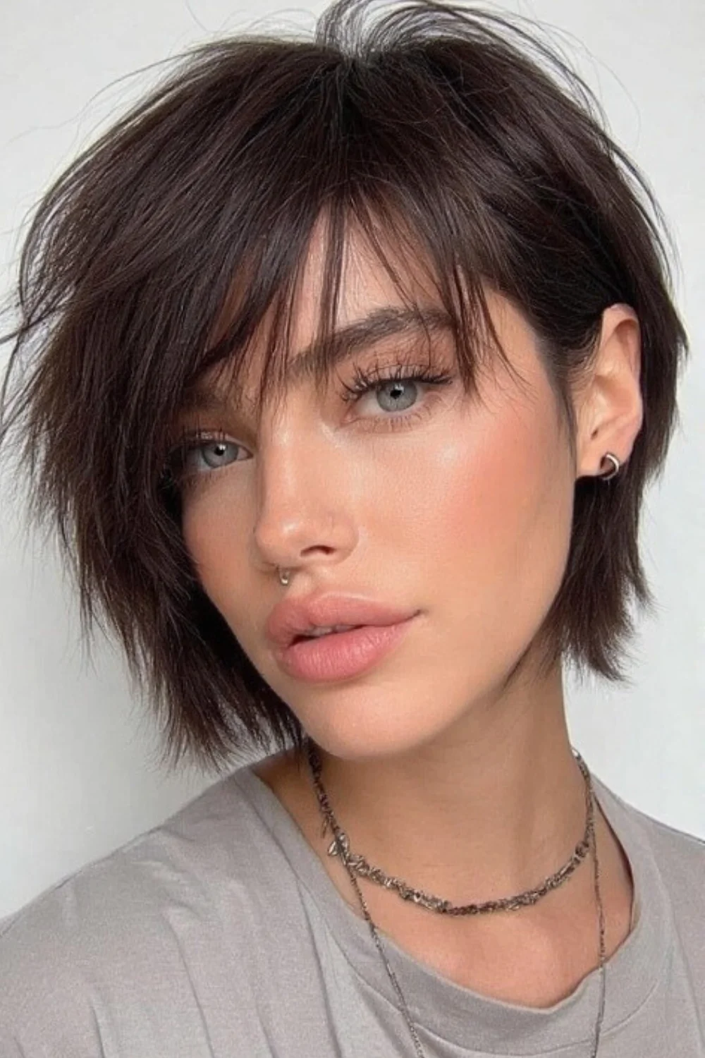 Pixie bob hairstyle with a relaxed, undone look. 