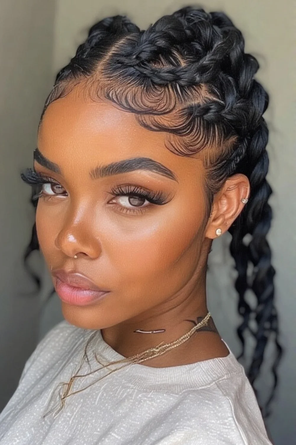 Flat twist hairstyle pinned back for a neat finish