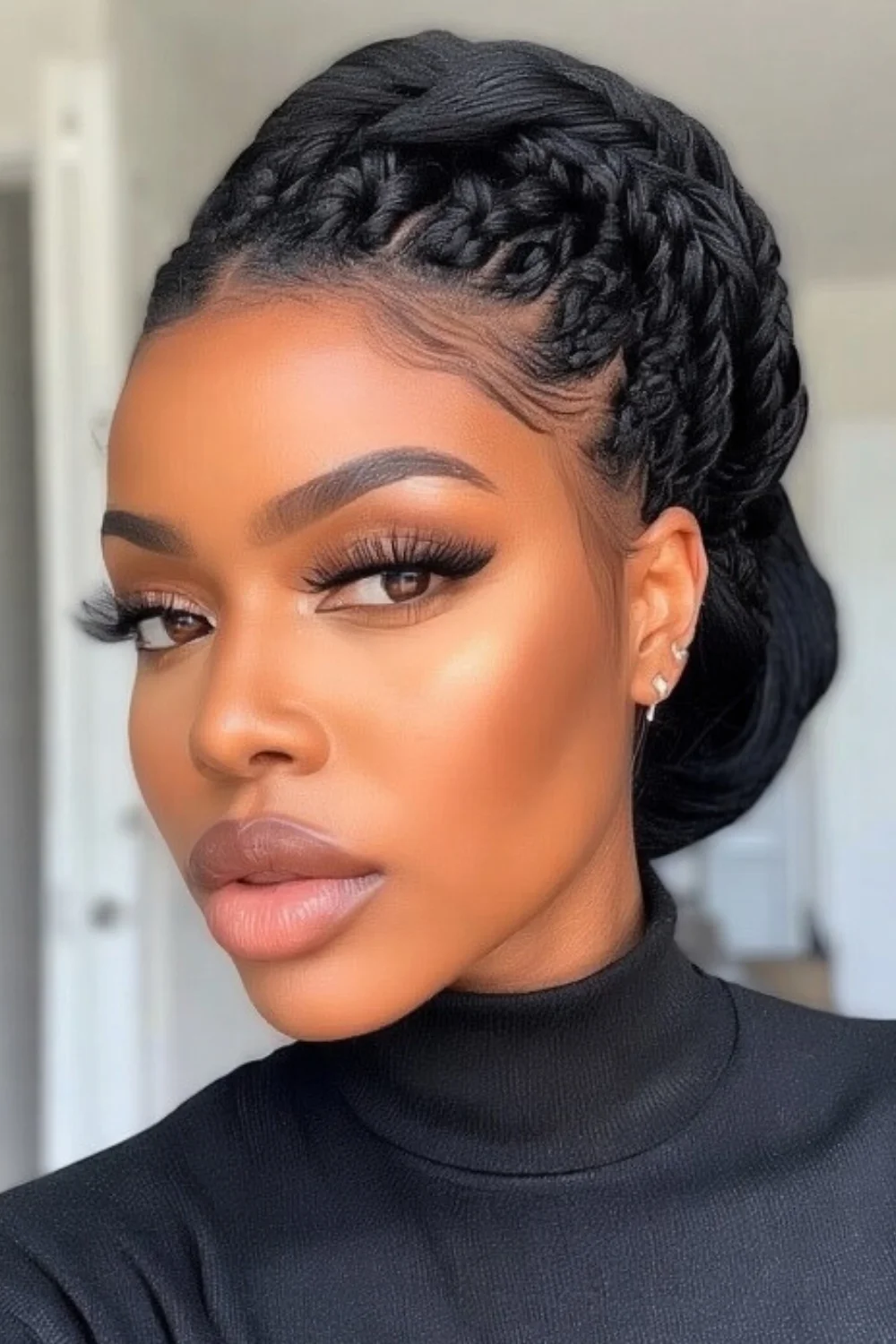 Natural hair styled in an elegant chignon
