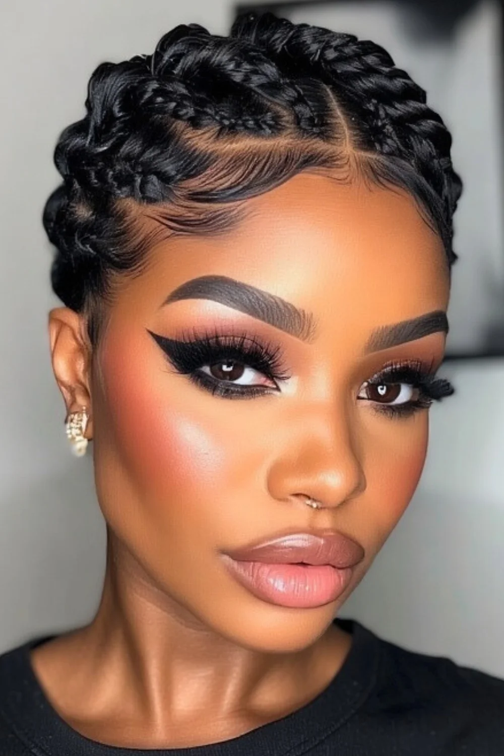Elegant short goddess braids styled close to the scalp 