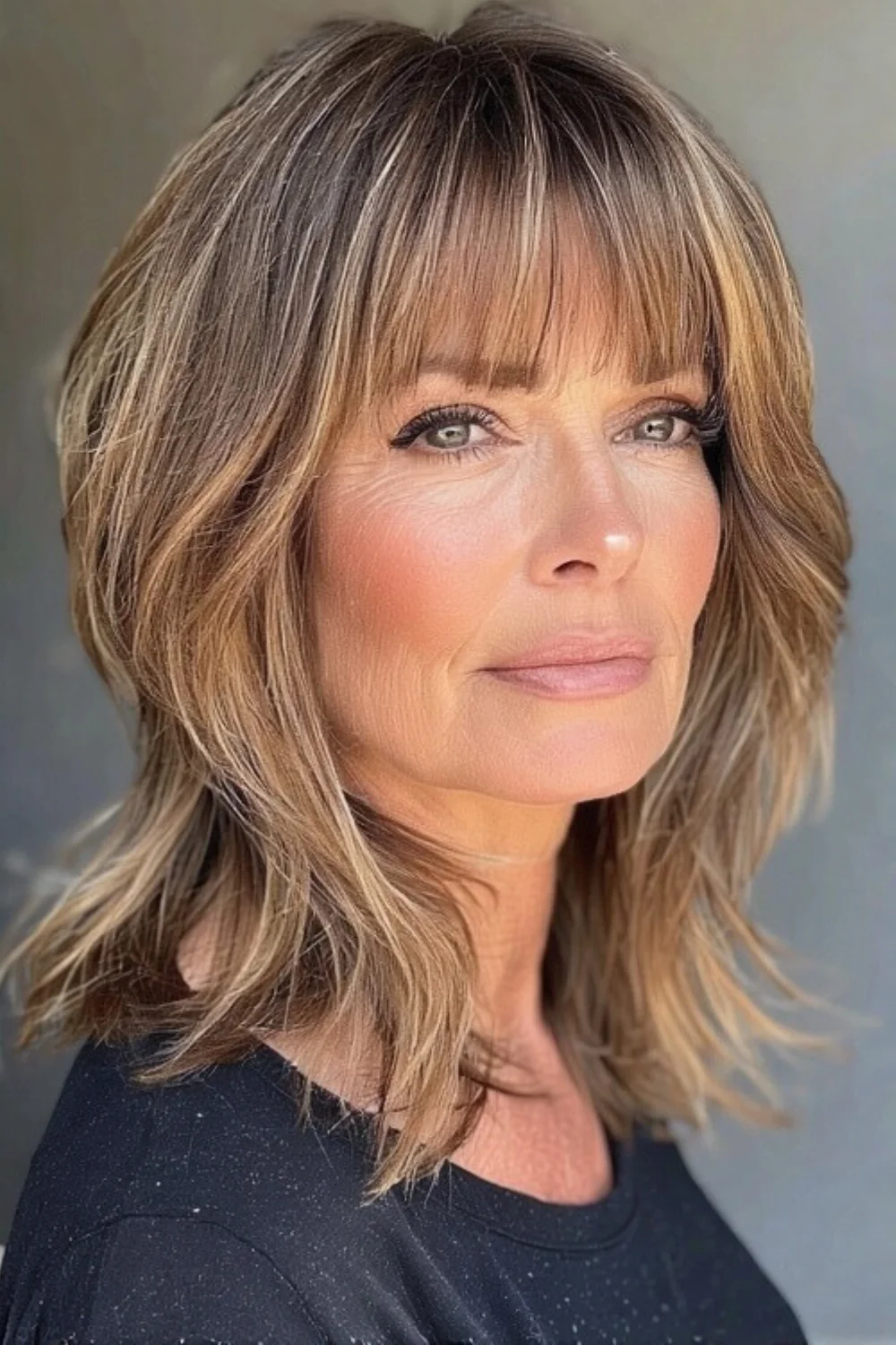 Short shag haircut paired with layered texture and bangs