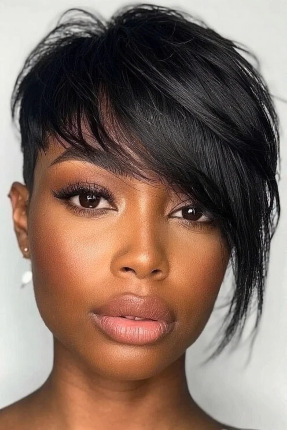 Hair with soft side swept bangs framing the face