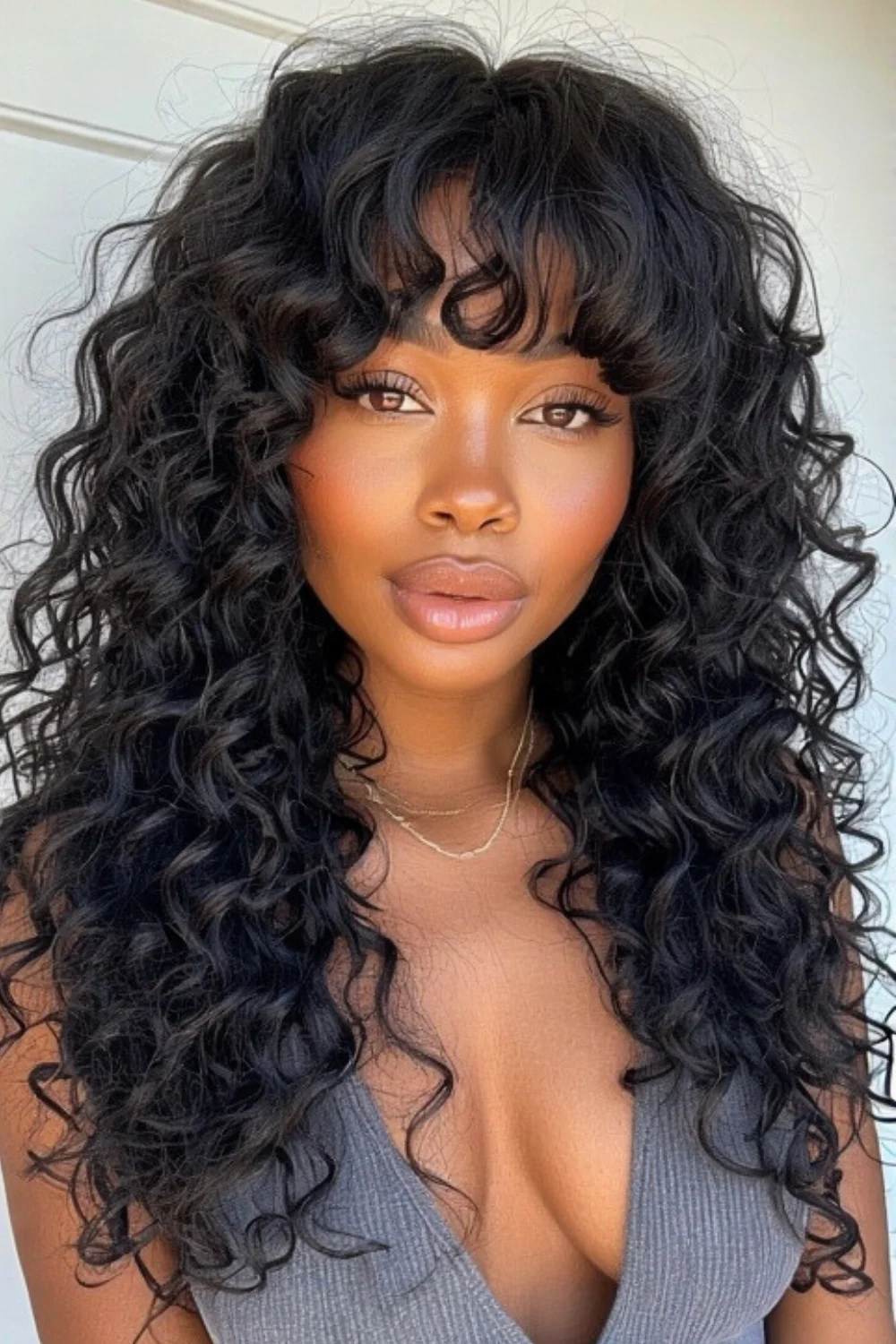 Simple everyday curls complemented by bangs

