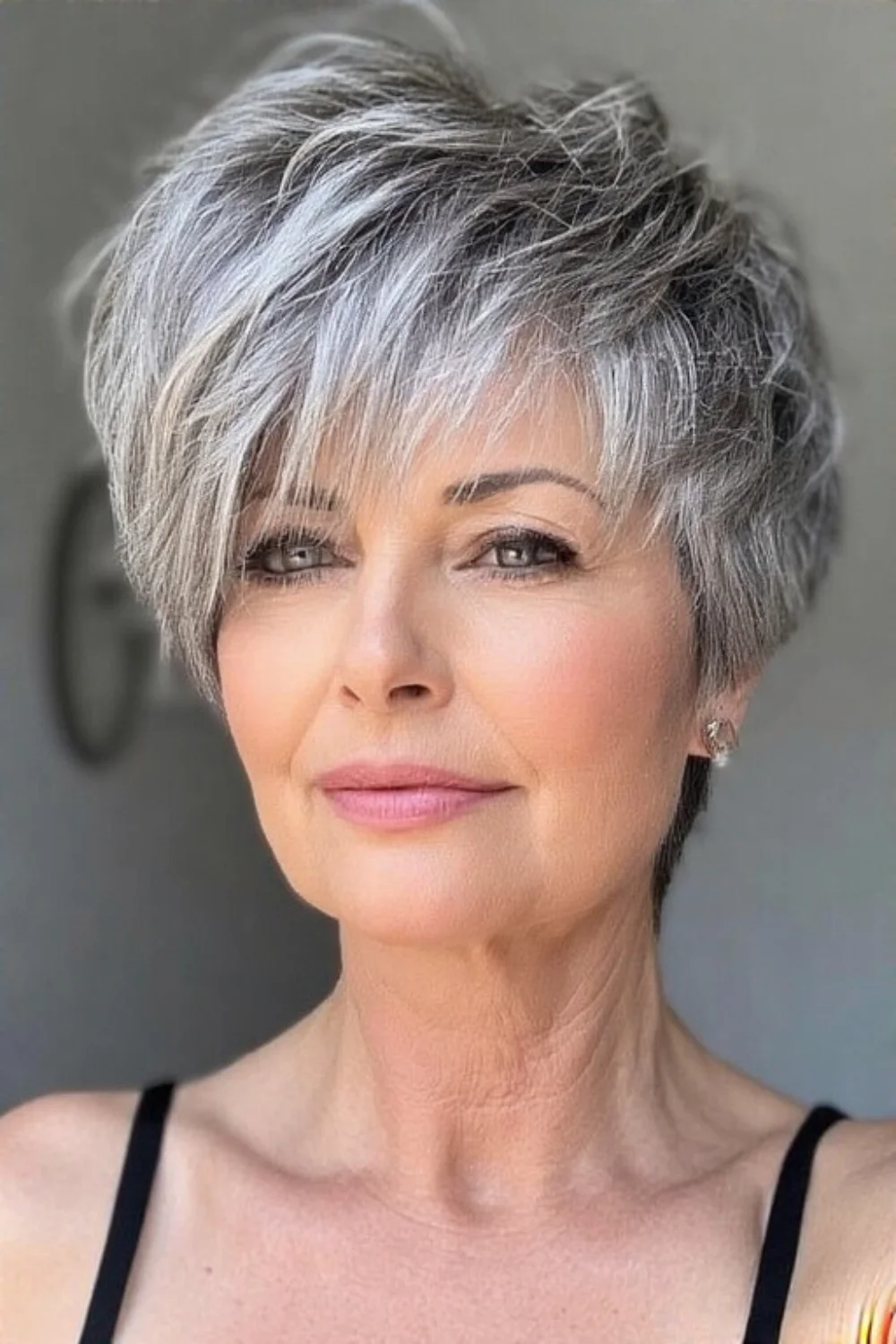 Sophisticated pixie cut styled for grey hair
