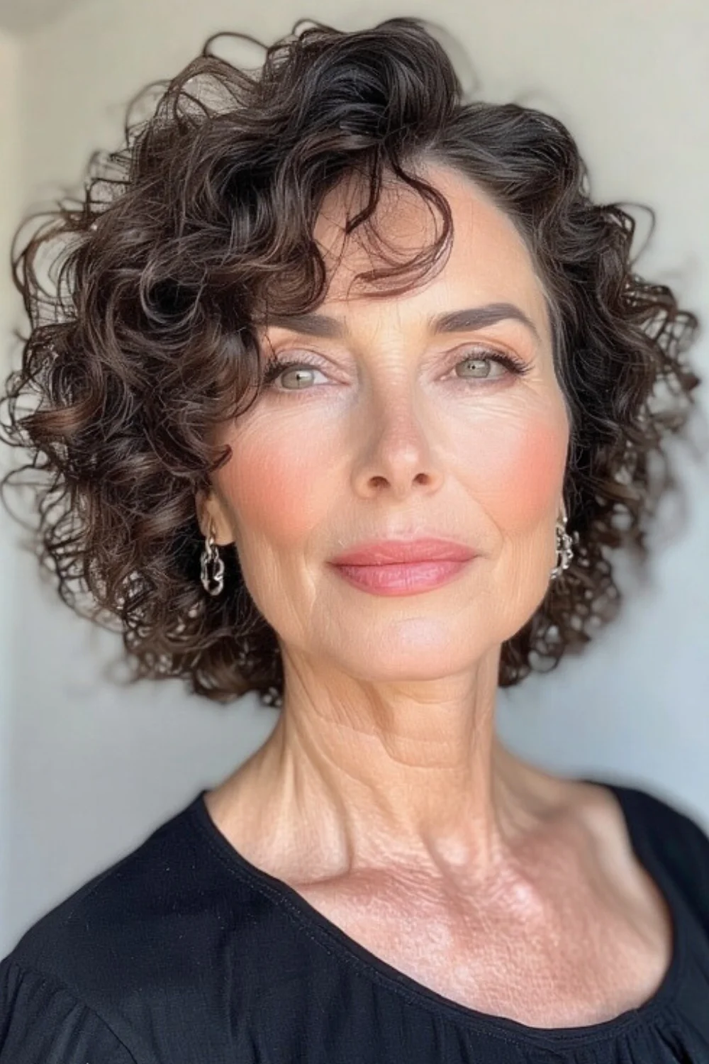 Elegant and sophisticated short curly hair design