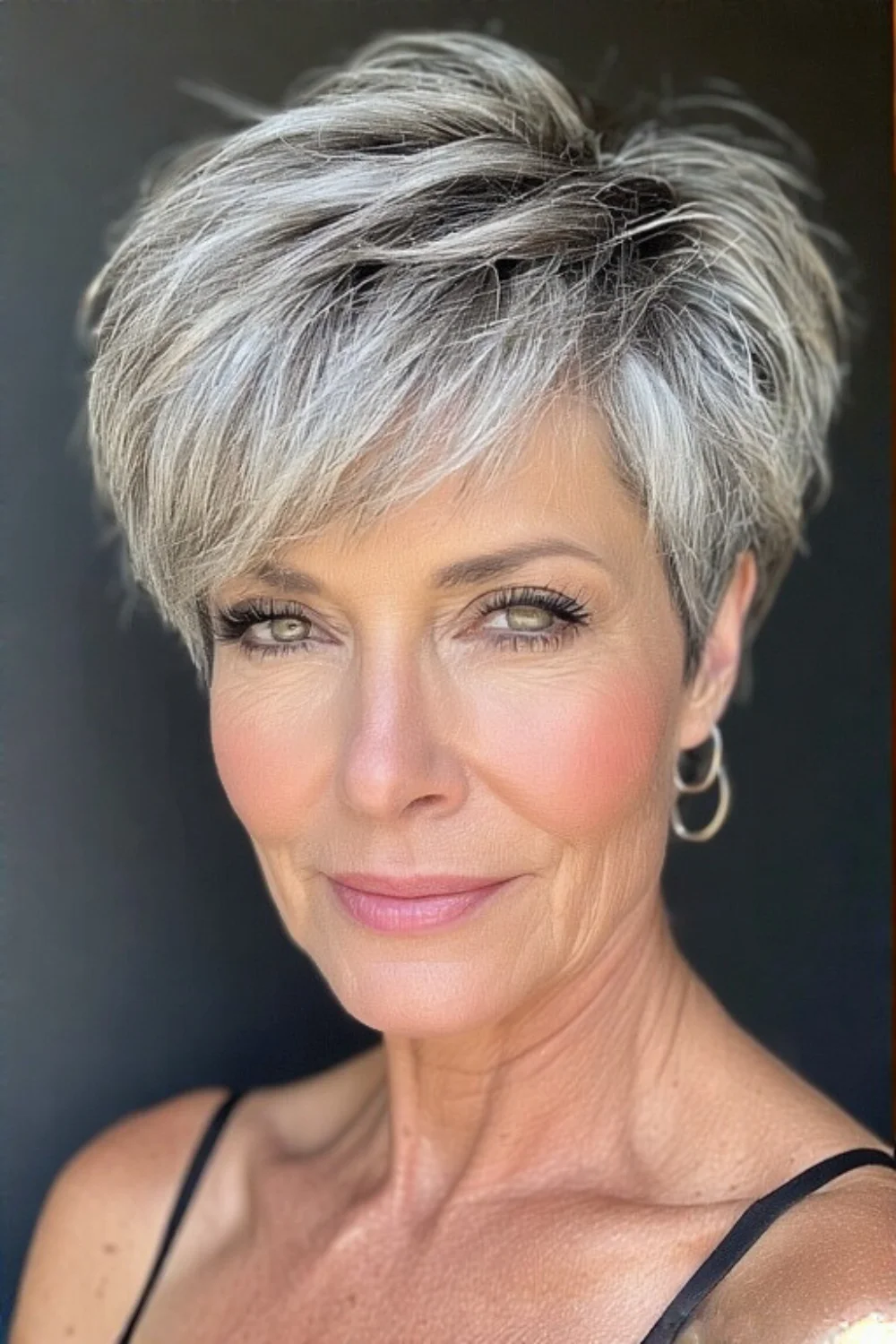 Voluminous pixie haircut with textured layers