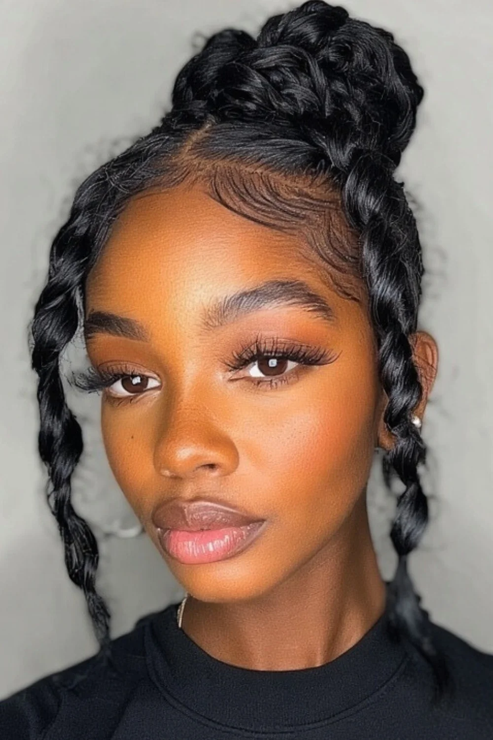 Twist out hairstyle smoothed with a flat iron