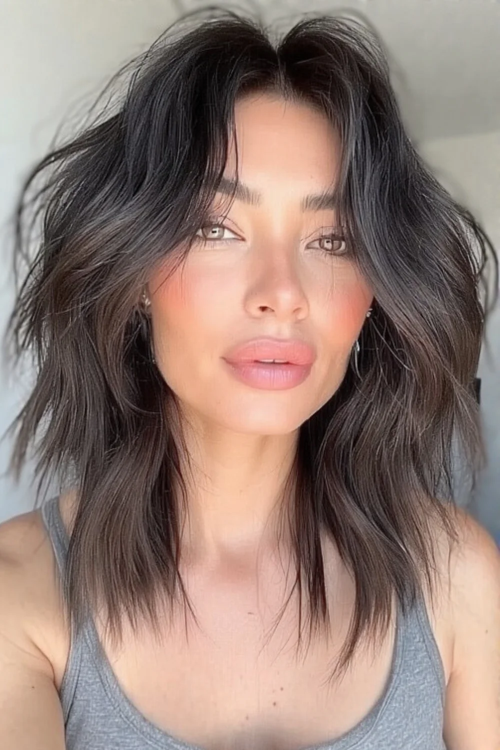 Long bob haircut with soft, flowing layers