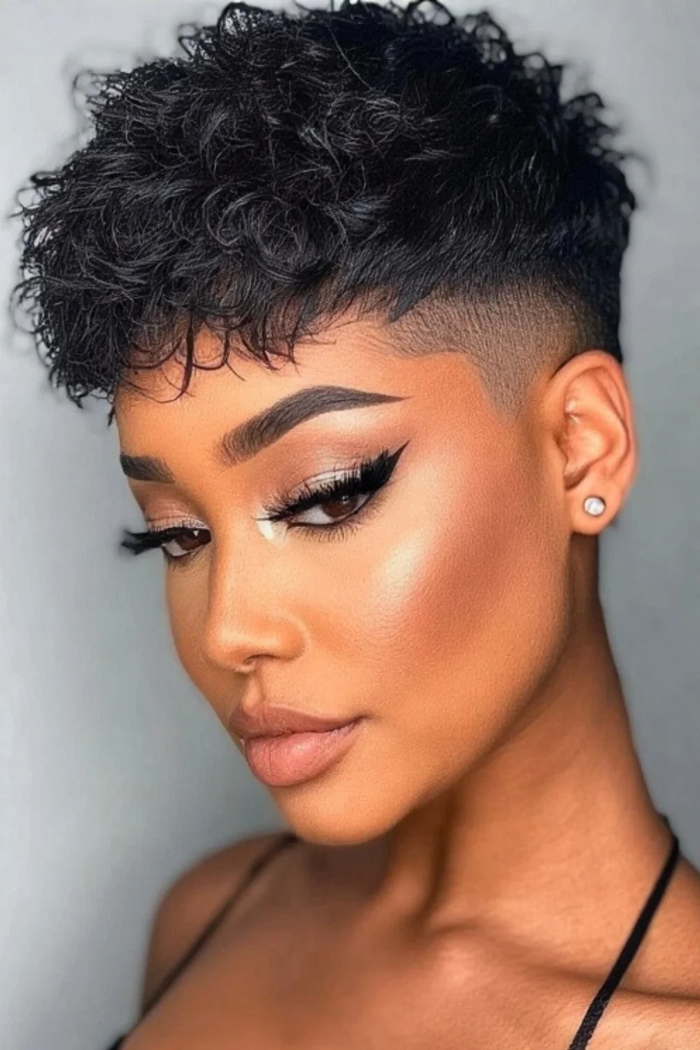 Pixie cut featuring a bold undercut for an edgy look 