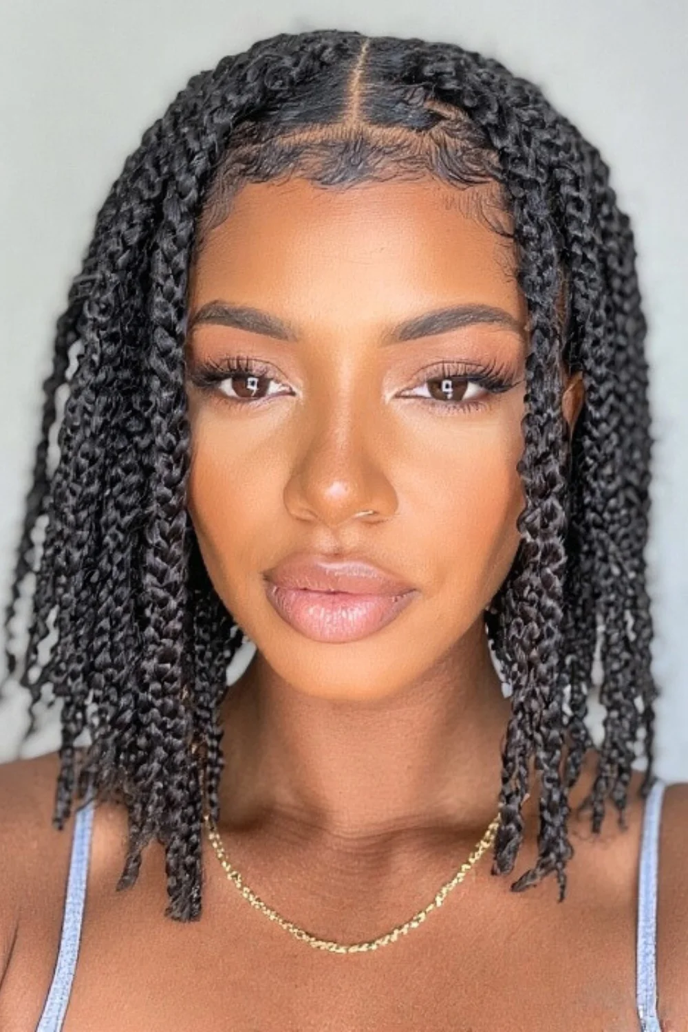 Step-by-step guide to installing short box braids
